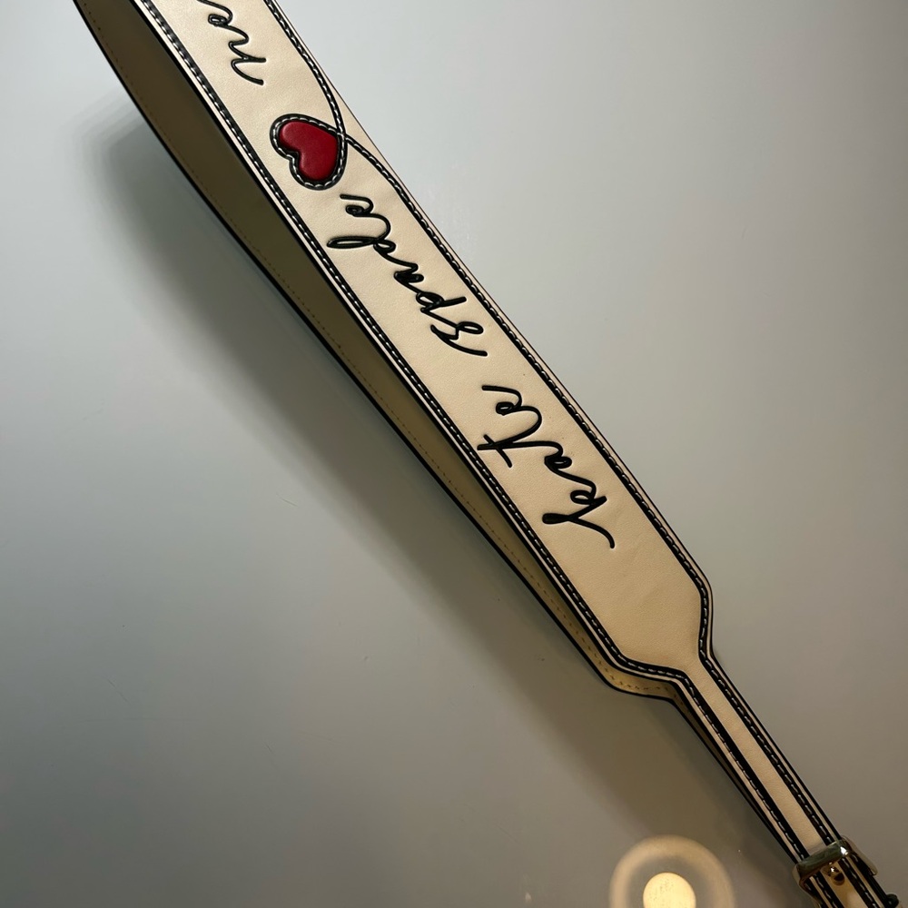 kate spade Cream Leather Strap with Red Heart and Script